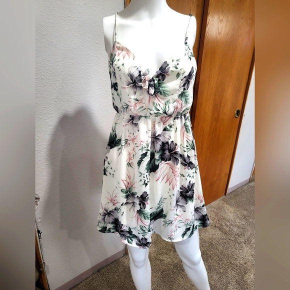 Multi color floral pattern A line slip on mini dress. - Picture 1 of 5